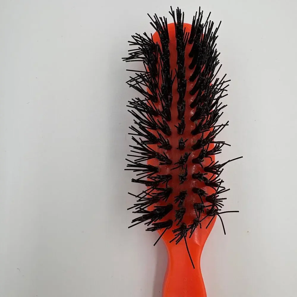 Vintage Orange Plastic Hair Brush Black Bristles Faceted Handle